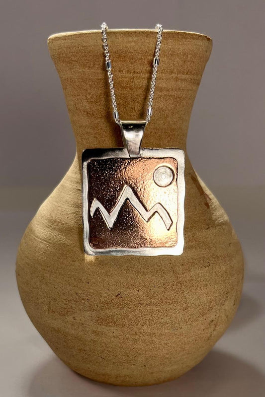 sterling silver copper pendant